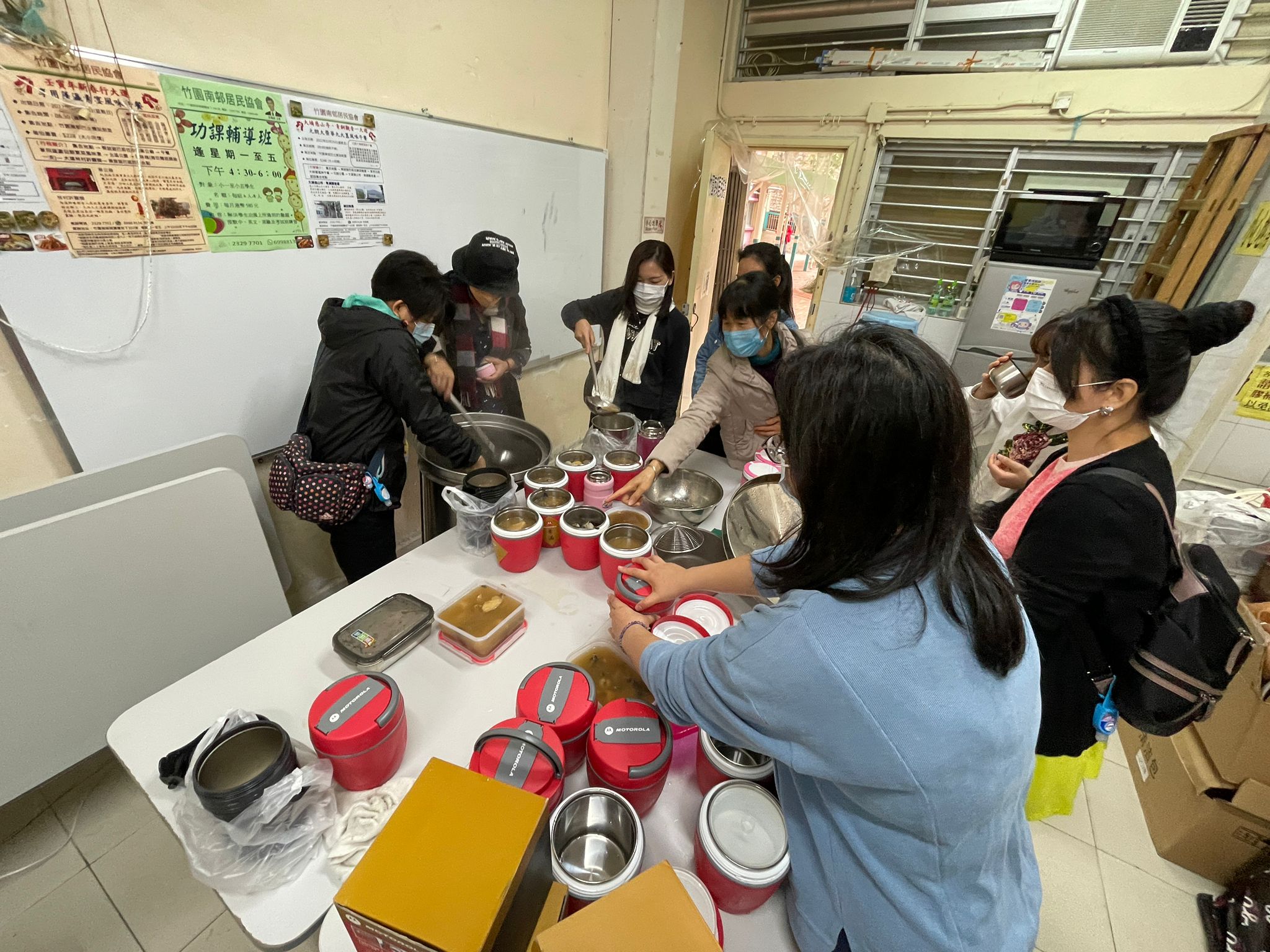 The housewives made soups for the needy elder person in the community together