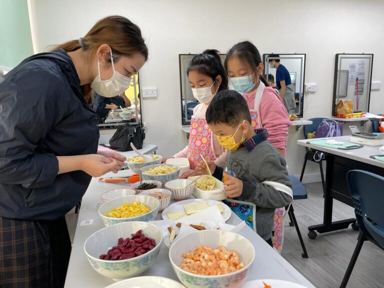 Working together with kids to make nutrient food to enhance their knowledge on healthy diet